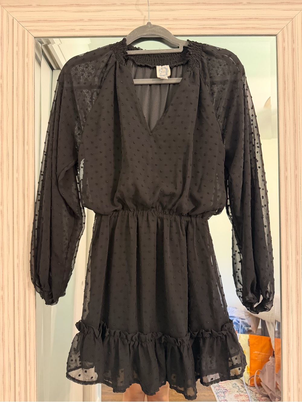 Francesca’s black long sleeve mini dress